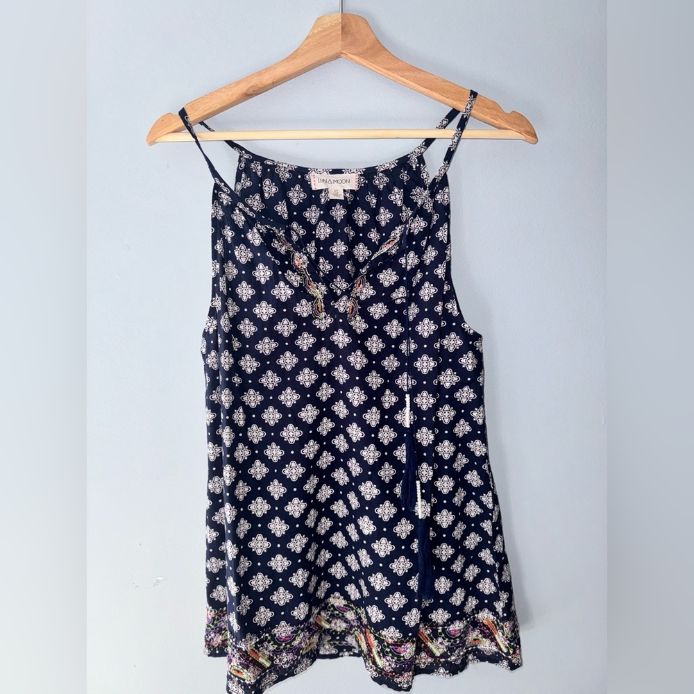 Solitaire blue Luna Moon shirt with two tassels.